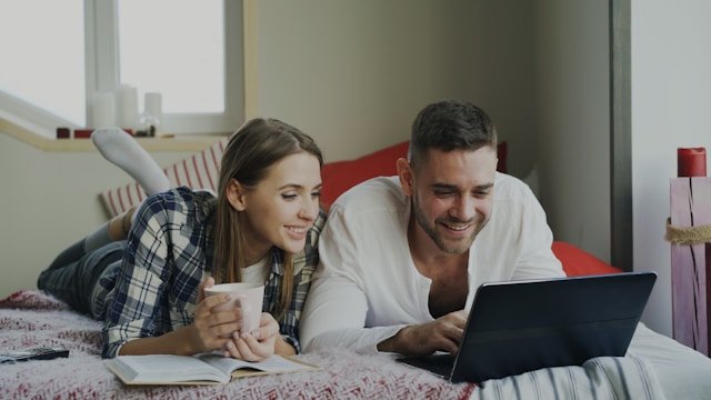 Couple budgeting together